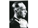 Fotografie: ppor. Wiktor Martini w mundurze i w ubraniu cywilnym.