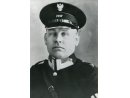 Fotografia: Józef Macoszek w mundurze starszego przodownika Policji Województwa Ślaskiego.